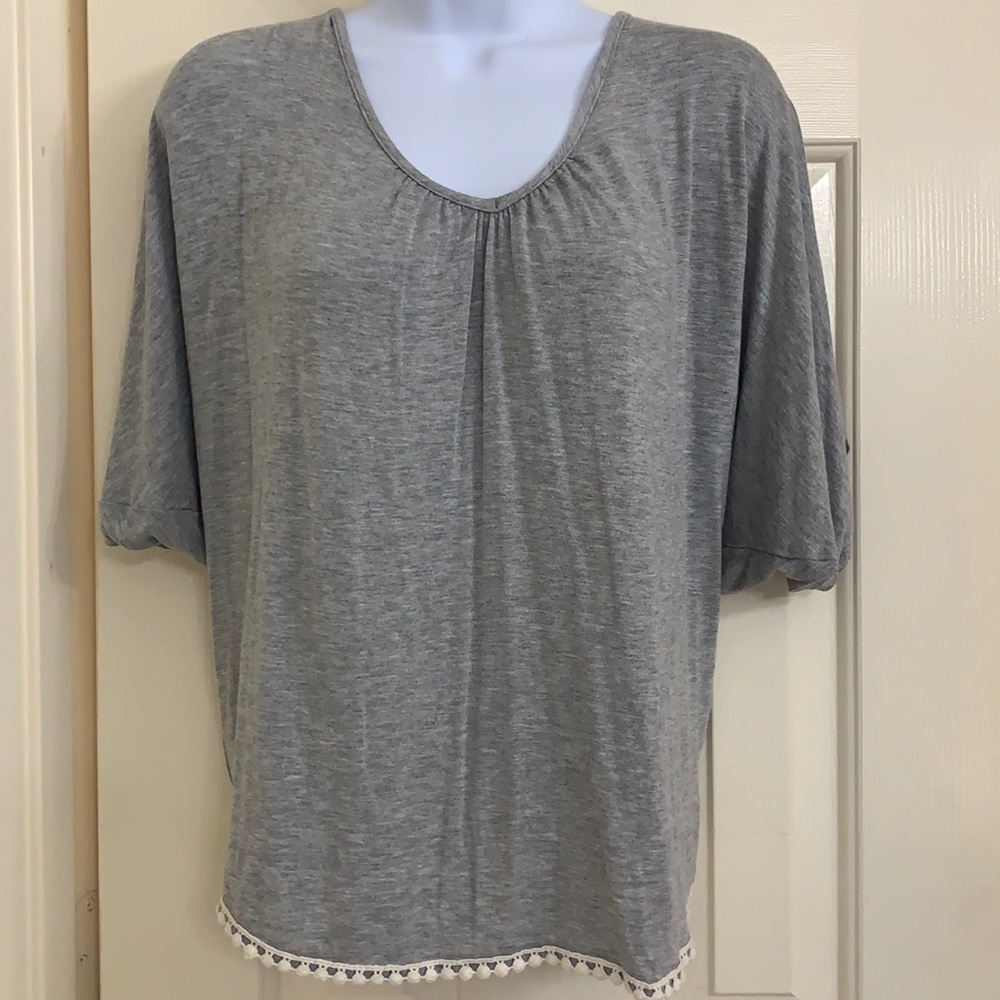 Cute ladies top, super soft with cute trim on bottom.